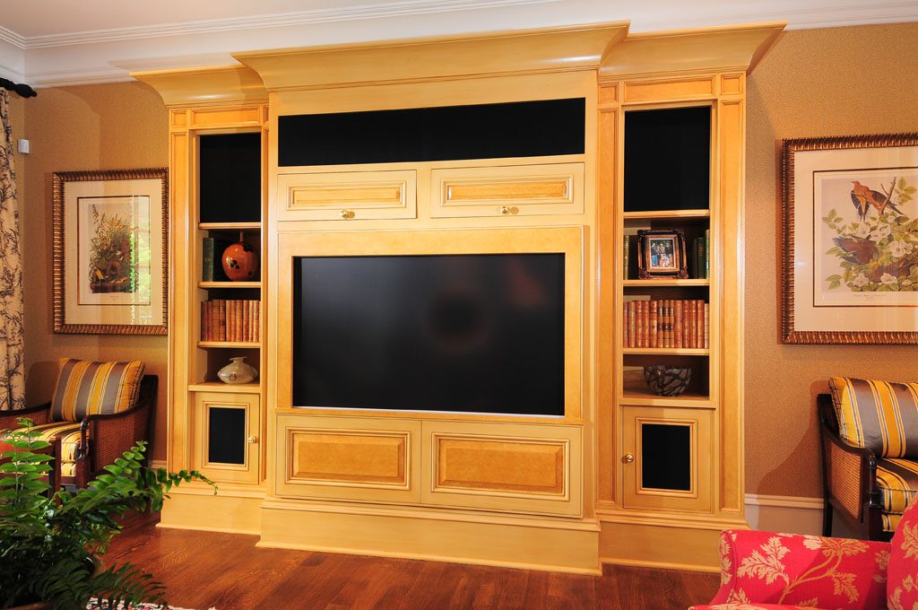 Built in entertainment center book case with cove mouldings