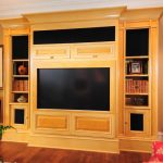 Built in entertainment center book case with cove mouldings